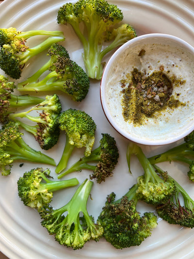 Blanched, charred Broccoli with Curry Leaf-Curd Chili yogurt dip